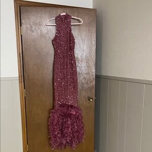 Elegant Sequin Gown with Feather Hem